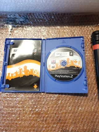 Juego SingStar PS2 + 2 Micrófonos