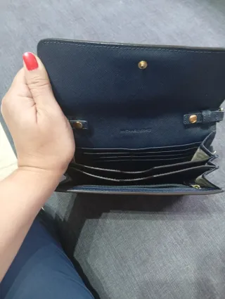 Bolso bandolera Michael Kors negro y dorado