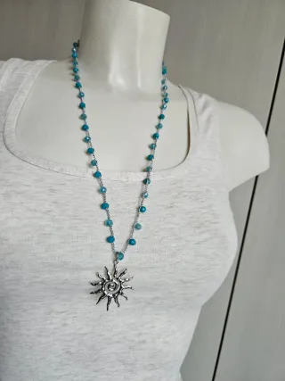 Collana con ciondolo sole e perline