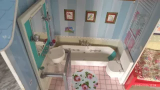 Casa de muñecas Amanda and family