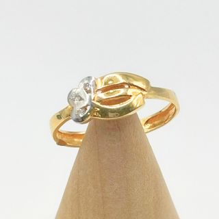 Anillo Oro Amarillo y Blanco 18K, 1.11gr T-10