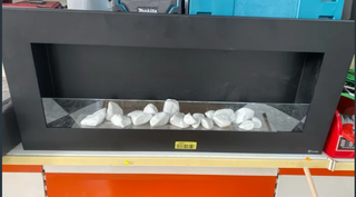 Chimenea bioetanol negra con piedras