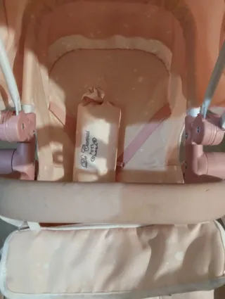 Carrito de muñecas rosa