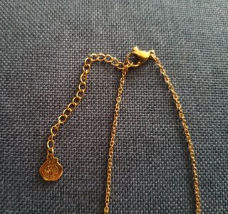 Cadena y cruz de perlas