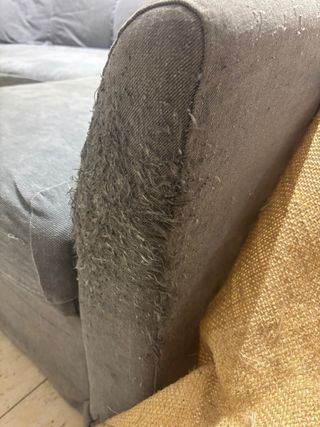 Sofà modular gris de tela amb fundes incloses