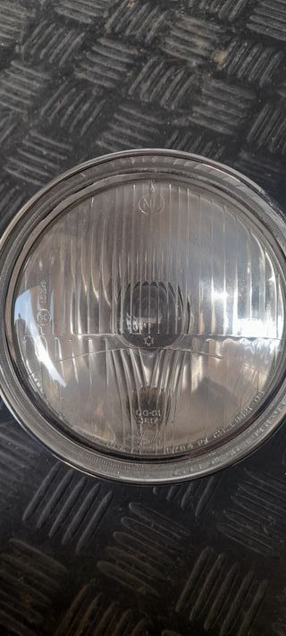 Piloto trasero Vespa de hierro y faro delantero y