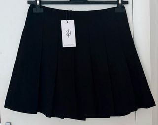 Falda plisada negra Stradivarius
