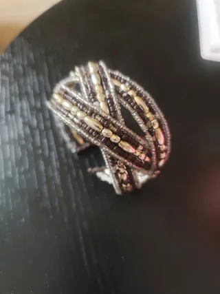 Braccialetto rigido perline marrone e oro