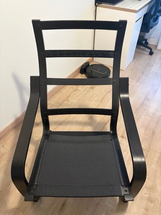 Silla mecedora de tela y madera