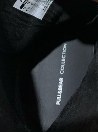 Botas pretas com atacadores