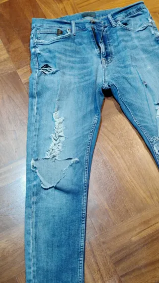 Jeans uomo strappati blu