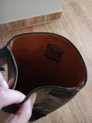 Botas altas de piel tacón negro