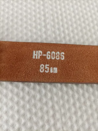 Cinturón con hebilla de estrella dorada