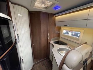 Autocaravana integral cama isla