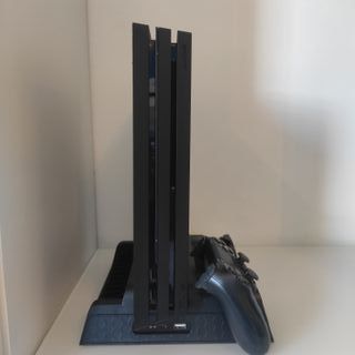 PS4 Pro 1TB + Dual Shock + base IOVO + funda
