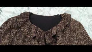 Blusa elegante con estampado animal print