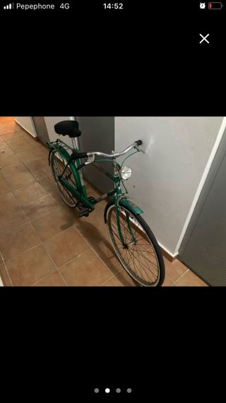 Bicicleta clásica verde