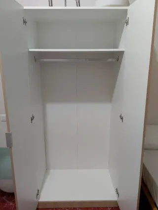 2 armarios de madera color beige,40 euros cada uno