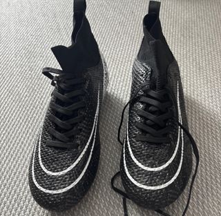 Botas de tacos Nike negras y blancas