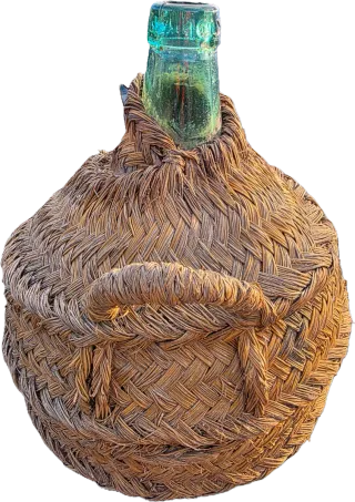 Garrafa de vidrio con esparto