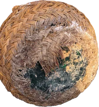 Garrafa de vidrio con esparto