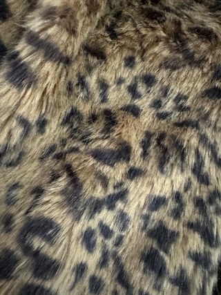 Abrigo pelo animal print niña