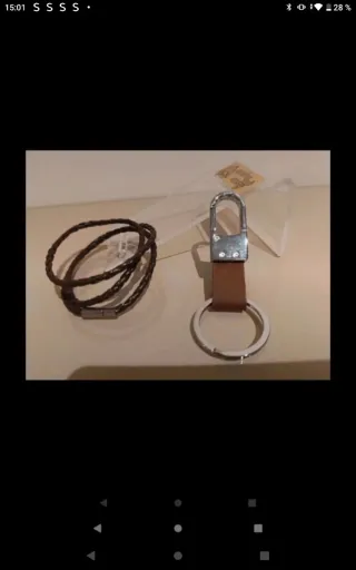 Pulsera cuero trenzado y llavero metal