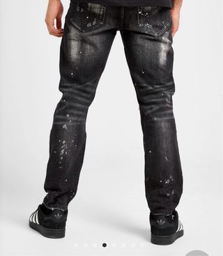 Pantalones vaqueros negros con salpicaduras