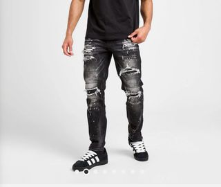 Pantalones vaqueros negros con salpicaduras