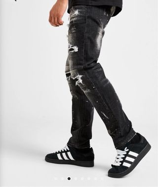 Pantalones vaqueros negros con salpicaduras