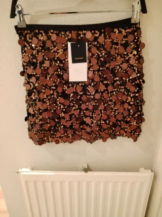 Minifalda Zara lentejuelas negra y dorada T.XS