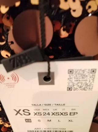 Minifalda Zara lentejuelas negra y dorada T.XS