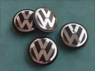 4TAPAS BUJE RUEDA LLANTA VOLKSWAGEN GOLF 3B7601171