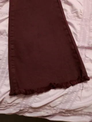 Vaqueros acampanados granates mujer