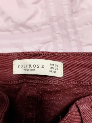 Vaqueros acampanados granates mujer