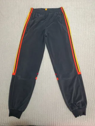 Pantalones Adidas Challenger gris tricolor