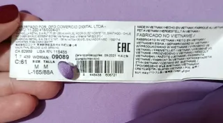 Vestido Mango plisado morado con hombreras