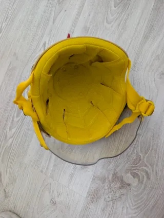 Casco infantil bicicleta dinosaurio amarillo