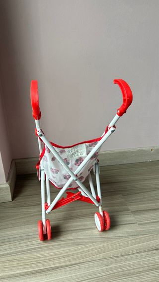 Cochecito para muñecas con diseño de mariquitas