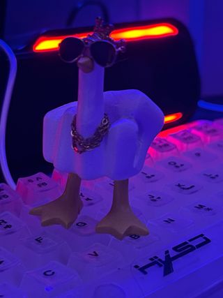 Pequeño figura de pato para coche