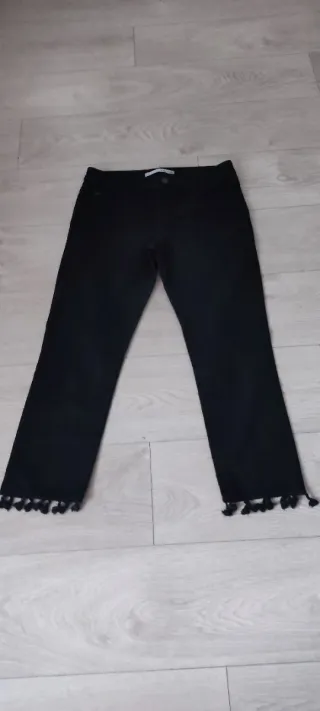 Tejanos negros con flecos