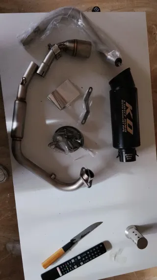 Tubo de escape TNT 125cc