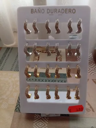 Juego de pendientes mujer baño dorado y plateado