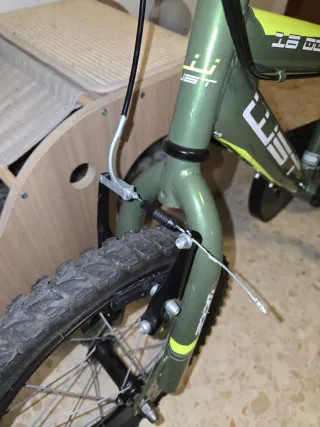 Bicicleta 16" wst elegance color verde y amarillo.