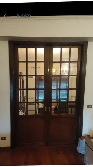 Porte scorrevoli in legno con vetri molati