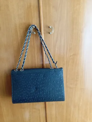 Borsetta donna con borchie e catena