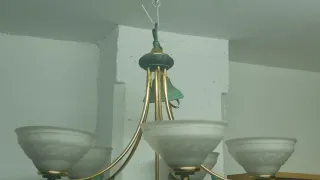 Lámpara de araña cristal y metal