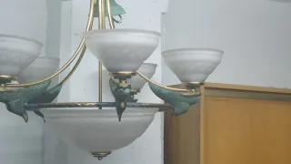 Lámpara de araña cristal y metal