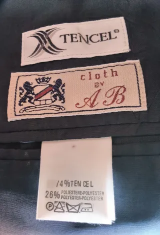 Completo uomo grigio mille righe.