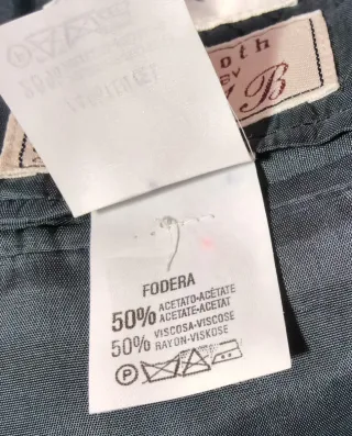 Completo uomo grigio mille righe.